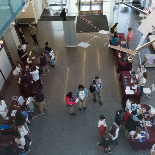 Birds-eye view of an info session at the Eckhardt Research Center atrium