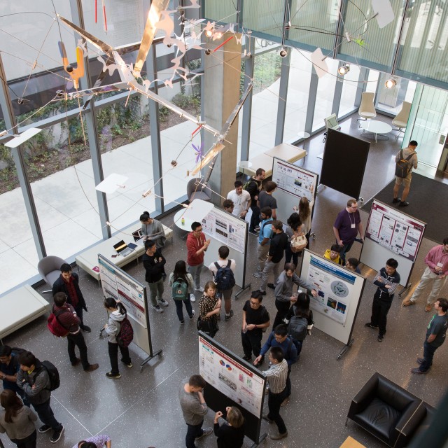 Birds-eye view of a poster session in the Eckhardt Research Center atrium