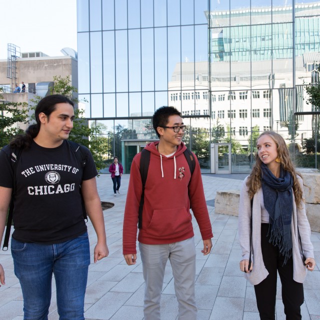 Graduate students Gustavo Andrés Vásquez Montoya, Daniel Cao, and Veronica Burnett take a break at the courtyard behind the Eckhardt Research Center