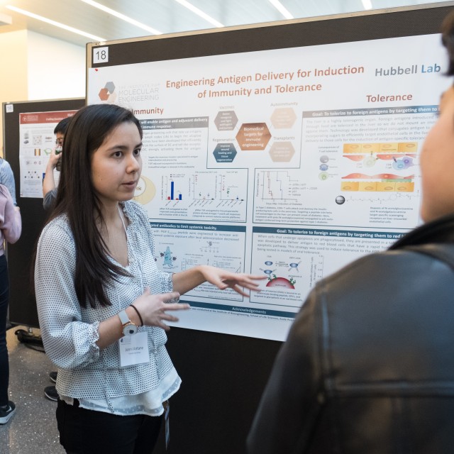 Hubbell lab member Jenni Antane describes the group&#039;s research to prospective PhD students at a visiting weekend