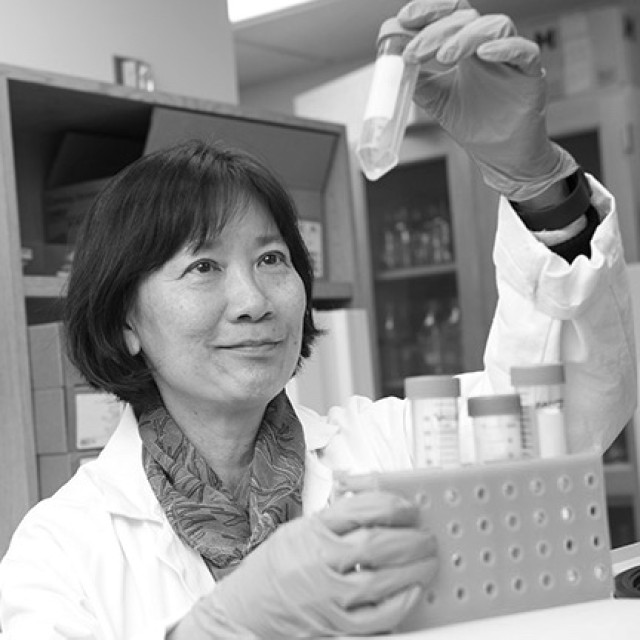 Black-and-white photo of Anita Chong in the lab