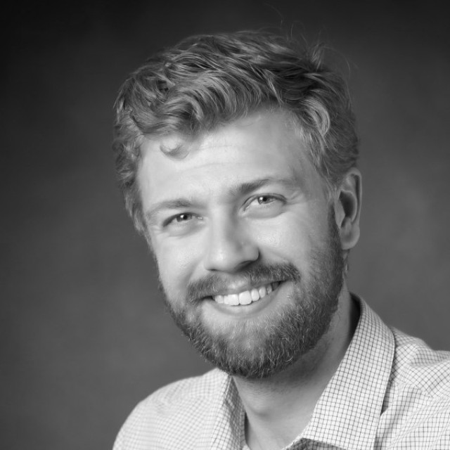 Black-and-white headshot of Andrew Ferguson