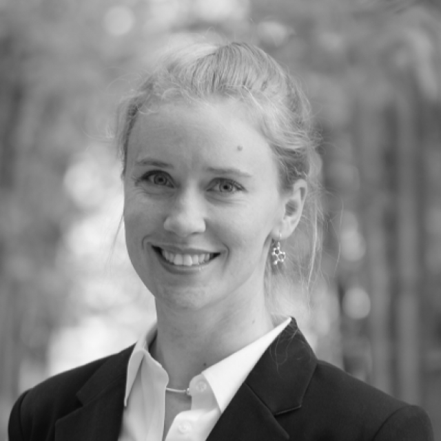 Black-and-white headshot of Allison Squires